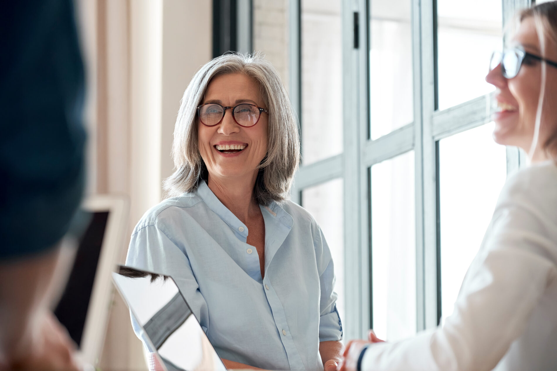 woman at table discussion business
