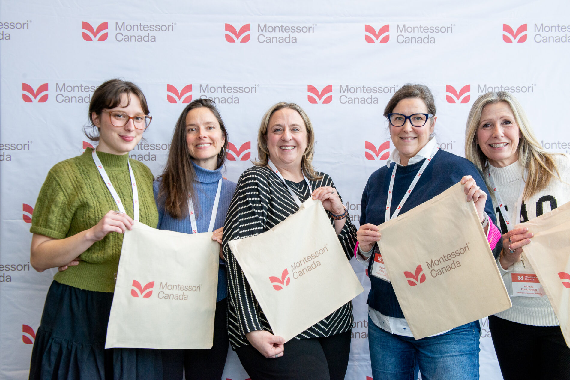 montessori canada people in front of step and repeat